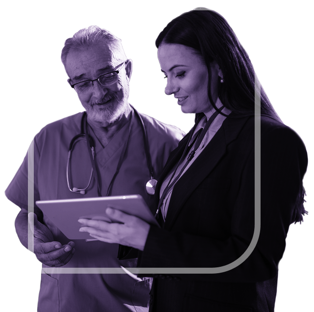 Doctor looking at ipad with administrator. 